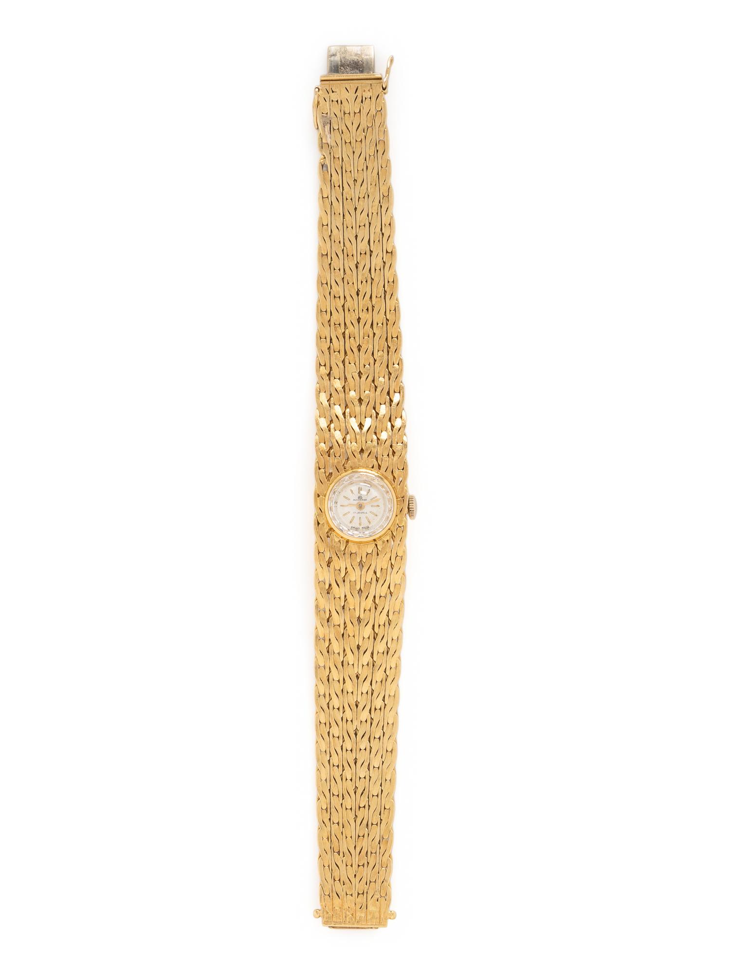 BOUCHERER, YELLOW GOLD WATCH
