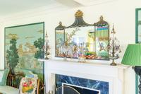 A Pair of Tole Peinte Two-Light Candelabra