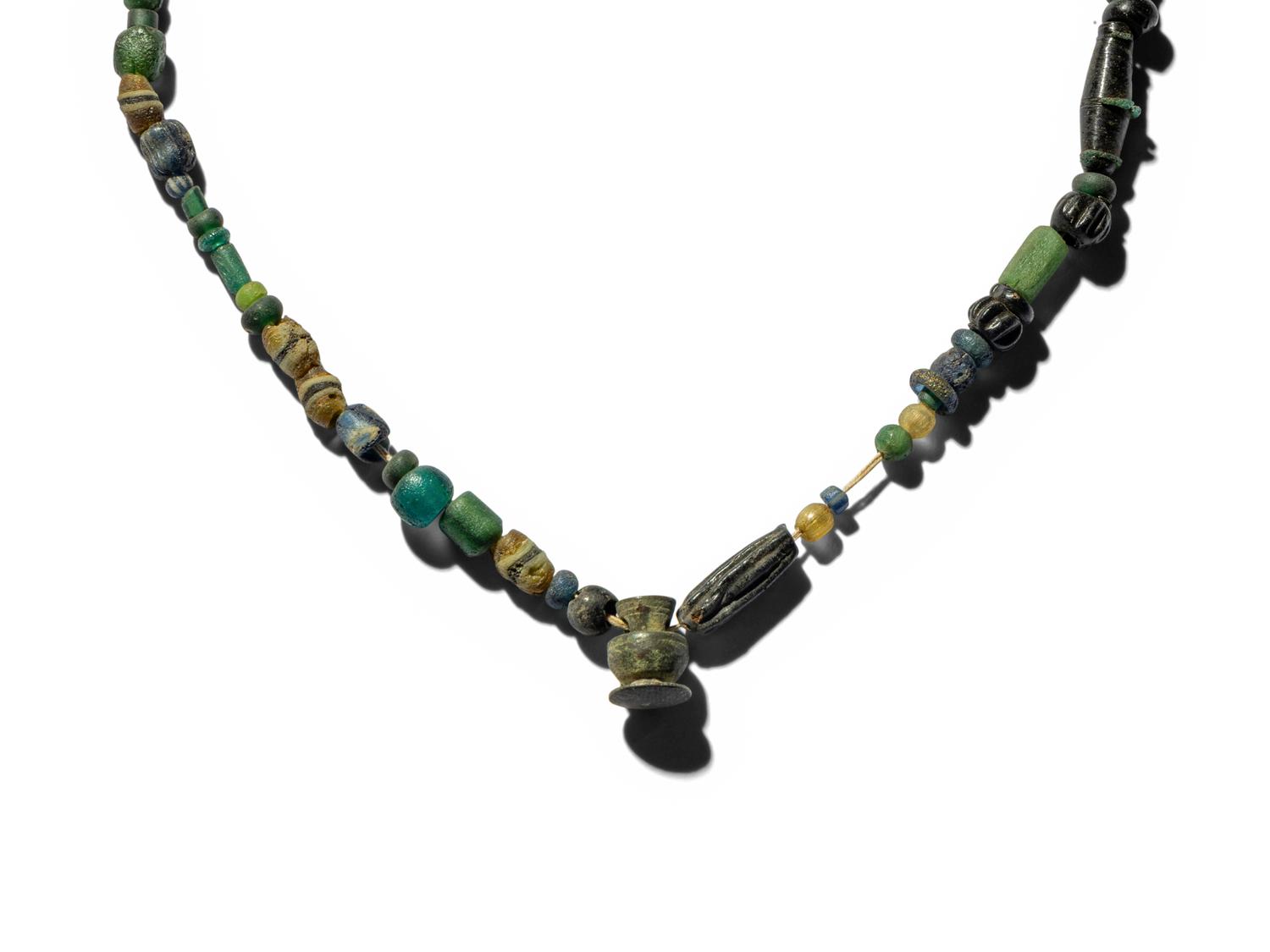 Five Roman and Eastern Mediterranean Glass Items