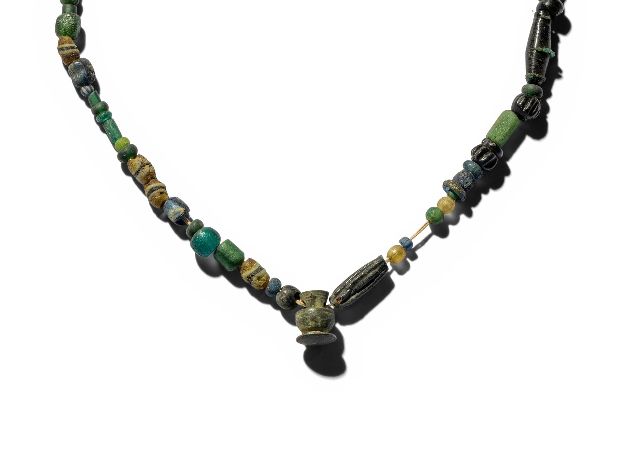 Five Roman and Eastern Mediterranean Glass Items
