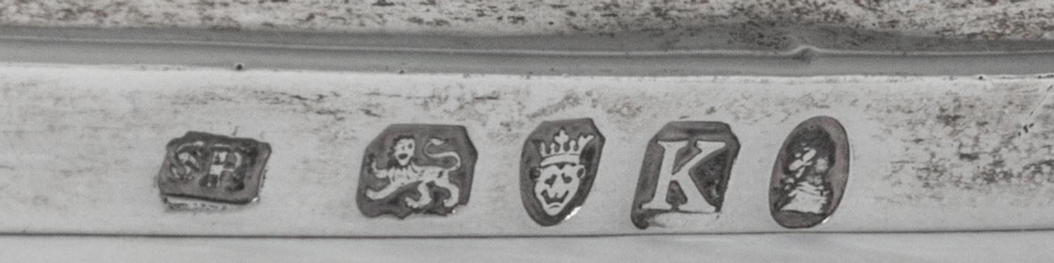 A George III Silver Basket, Solomon Hougham, London, 1805, with a swing handle and a gadrooned border.