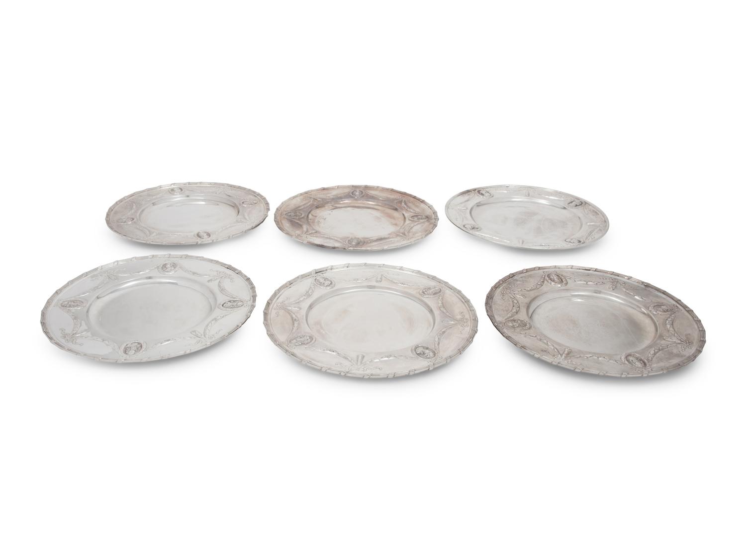A Set of Six German Silver Plates