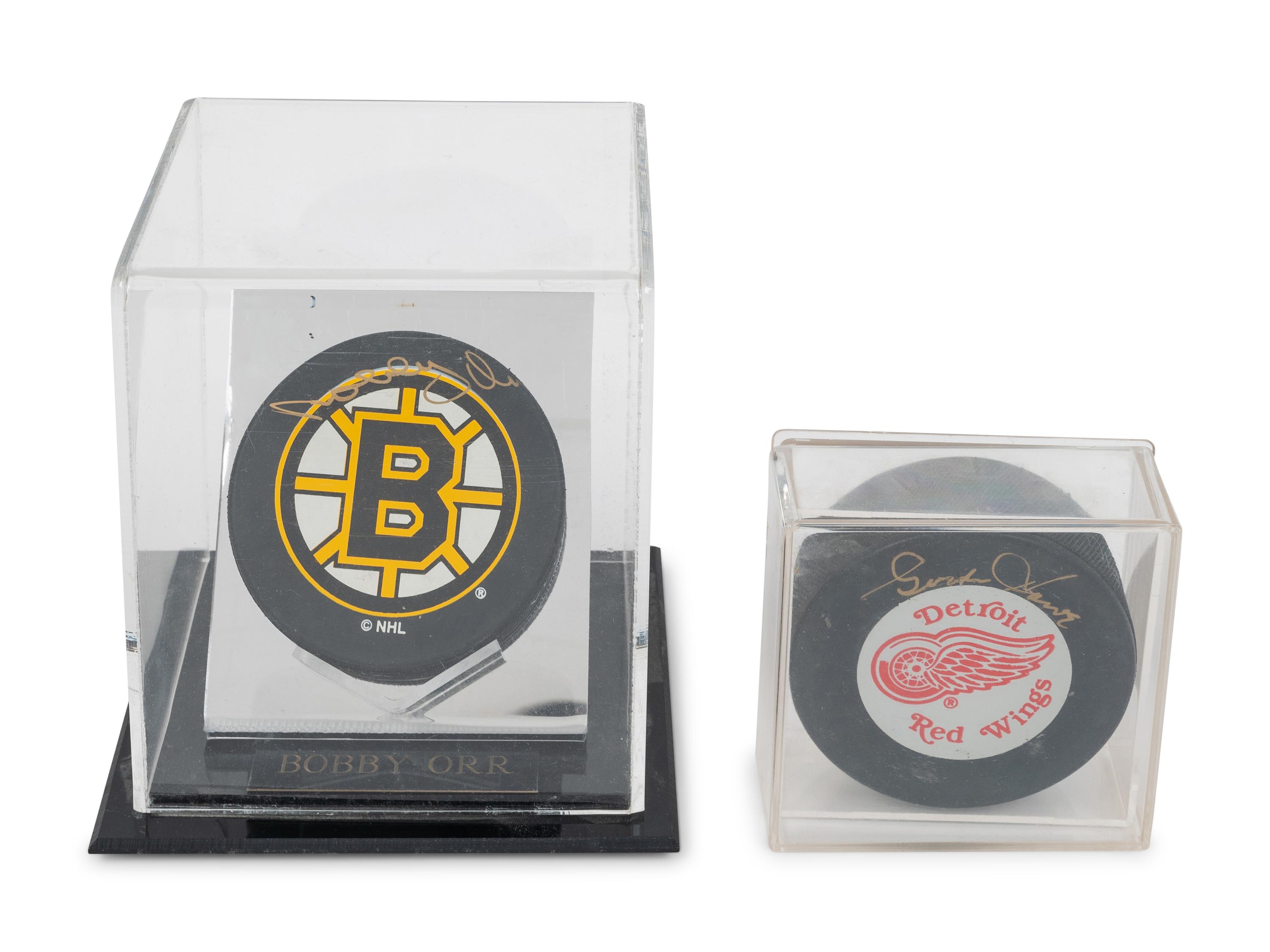A Group of Bobby Orr and Gordie Howe Signed Autograph NHL Hockey Pucks,