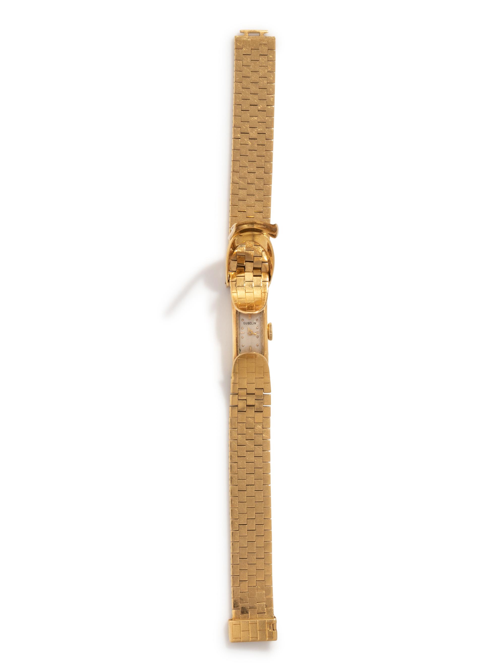 GÜBELIN, 18K YELLOW GOLD SURPRISE WATCH