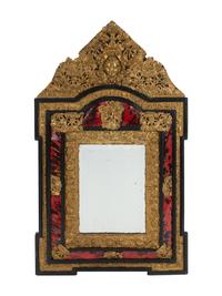 A Flemish Baroque Style Parcel Ebonized and Repoussé Brass Mirror