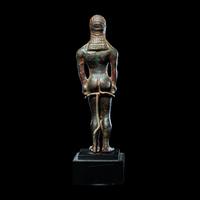 A Greek Bronze Kouros