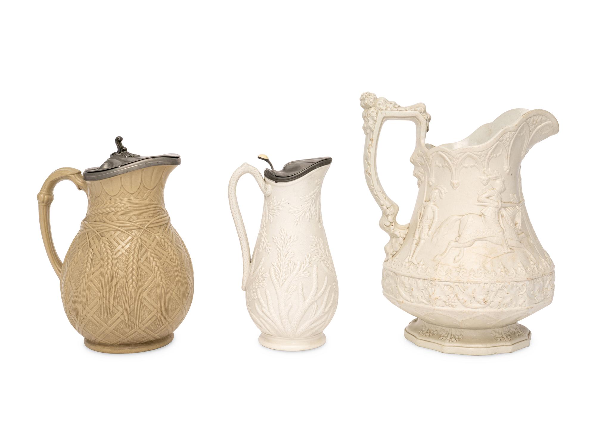 Three English Salt-Glazed Earthenware Pitchers