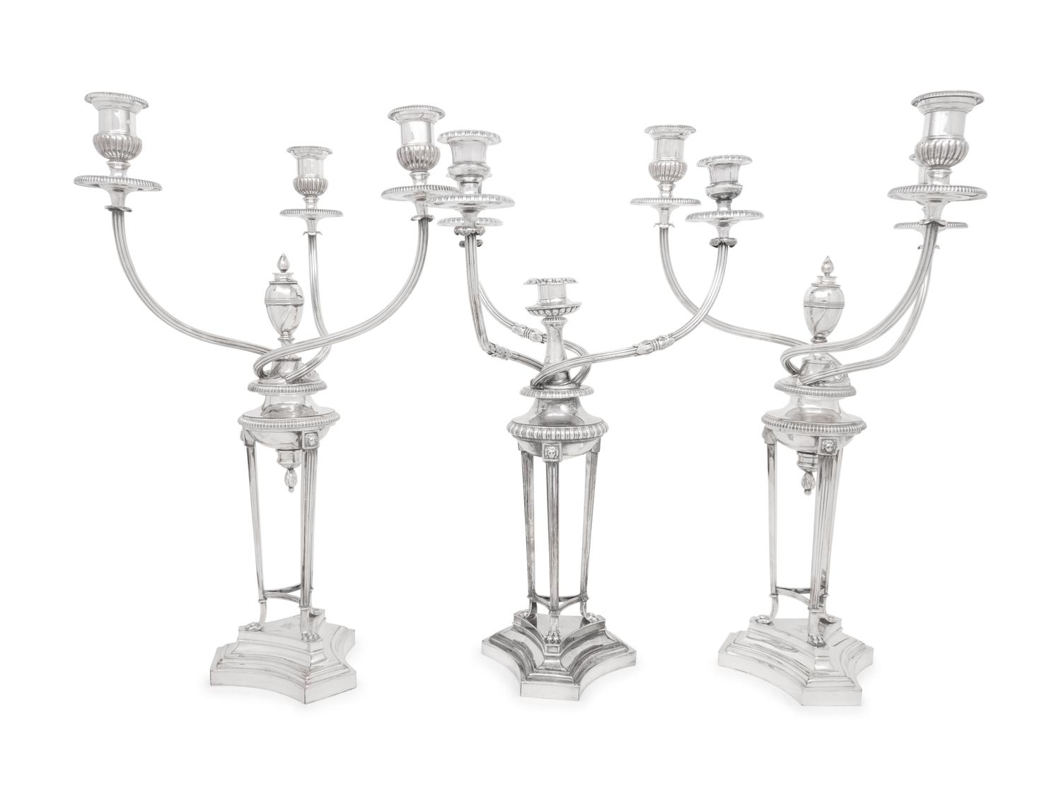 A Set of Three Silver-Plate Three-Light Candelabra