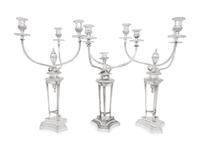 A Set of Three Silver-Plate Three-Light Candelabra
