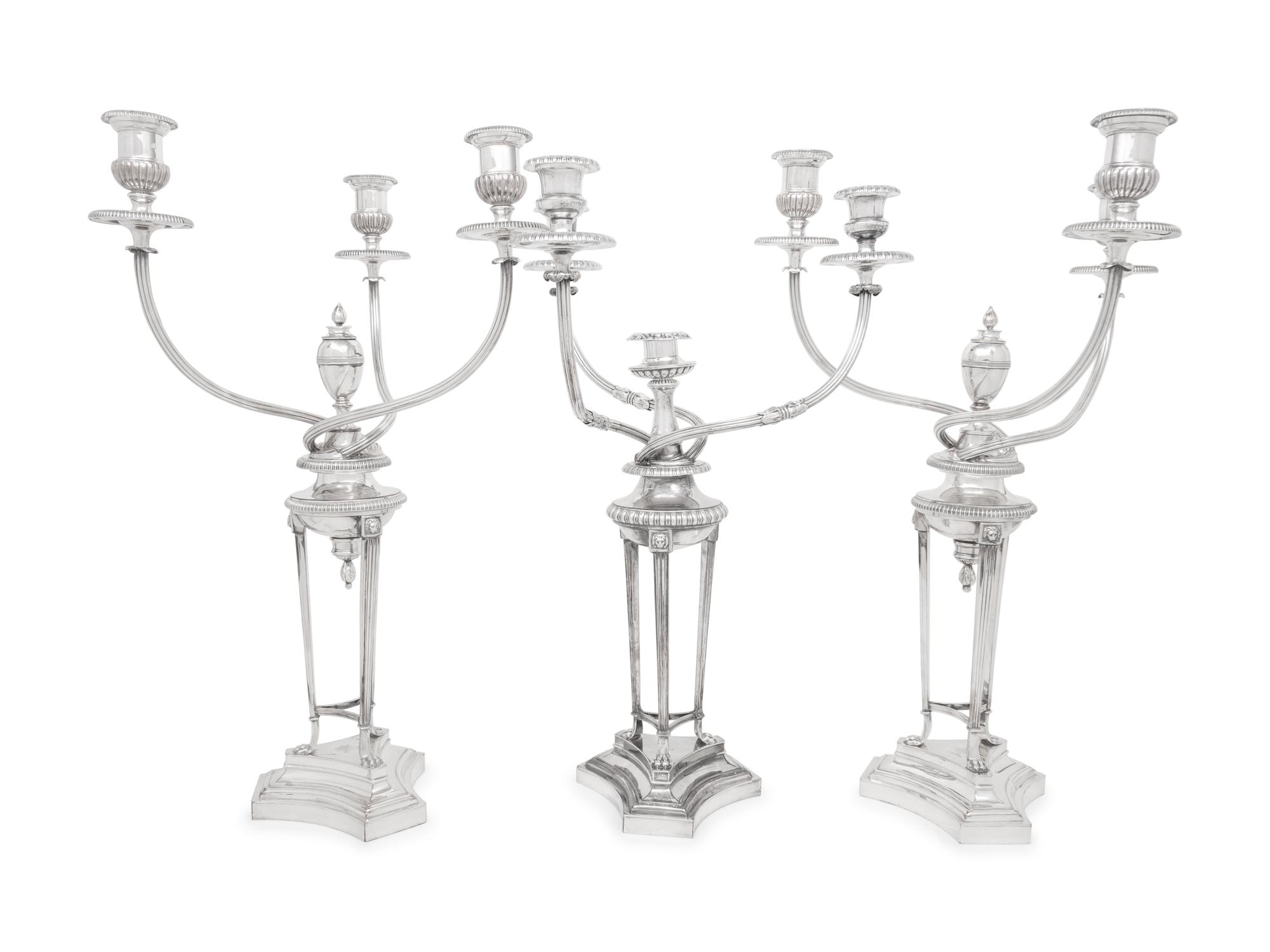 A Set of Three Silver-Plate Three-Light Candelabra