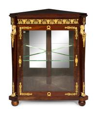 An Empire Style Gilt Bronze Mounted Corner Cabinet