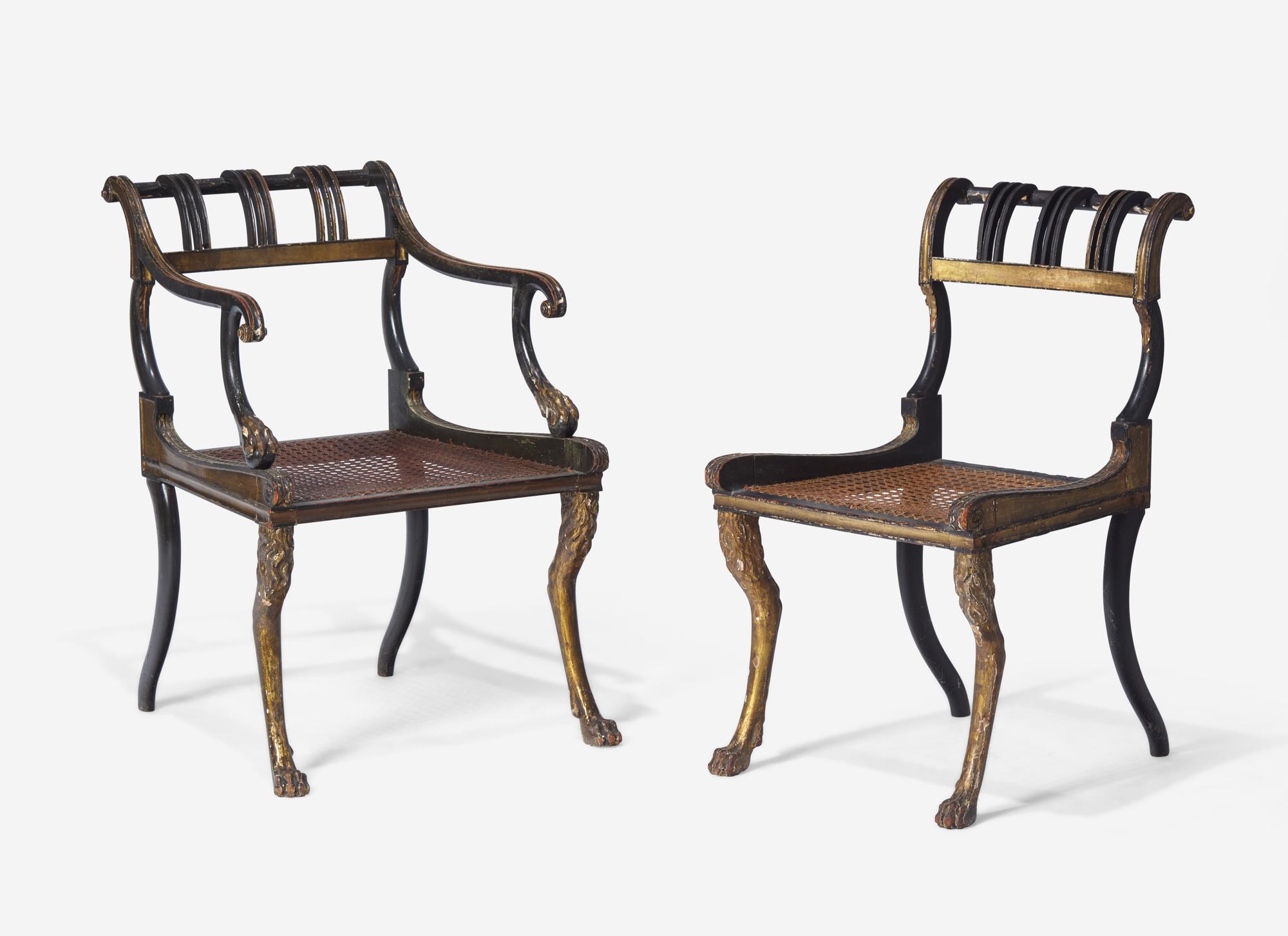A Set of Three Regency Parcel-Gilt and Ebonized Caned Seat Dining Chairs