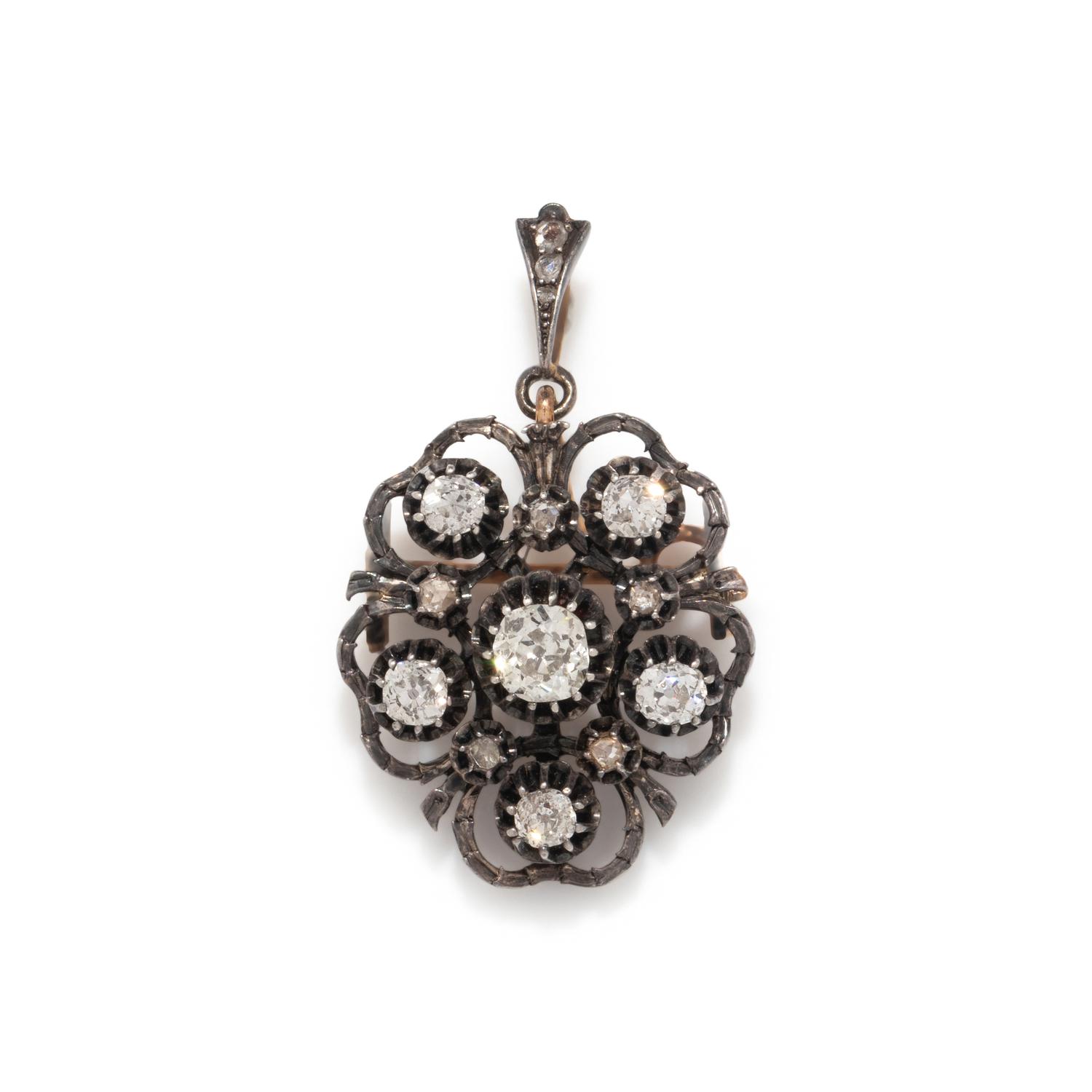 SILVER-TOPPED GOLD AND DIAMOND PENDANT/BROOCH