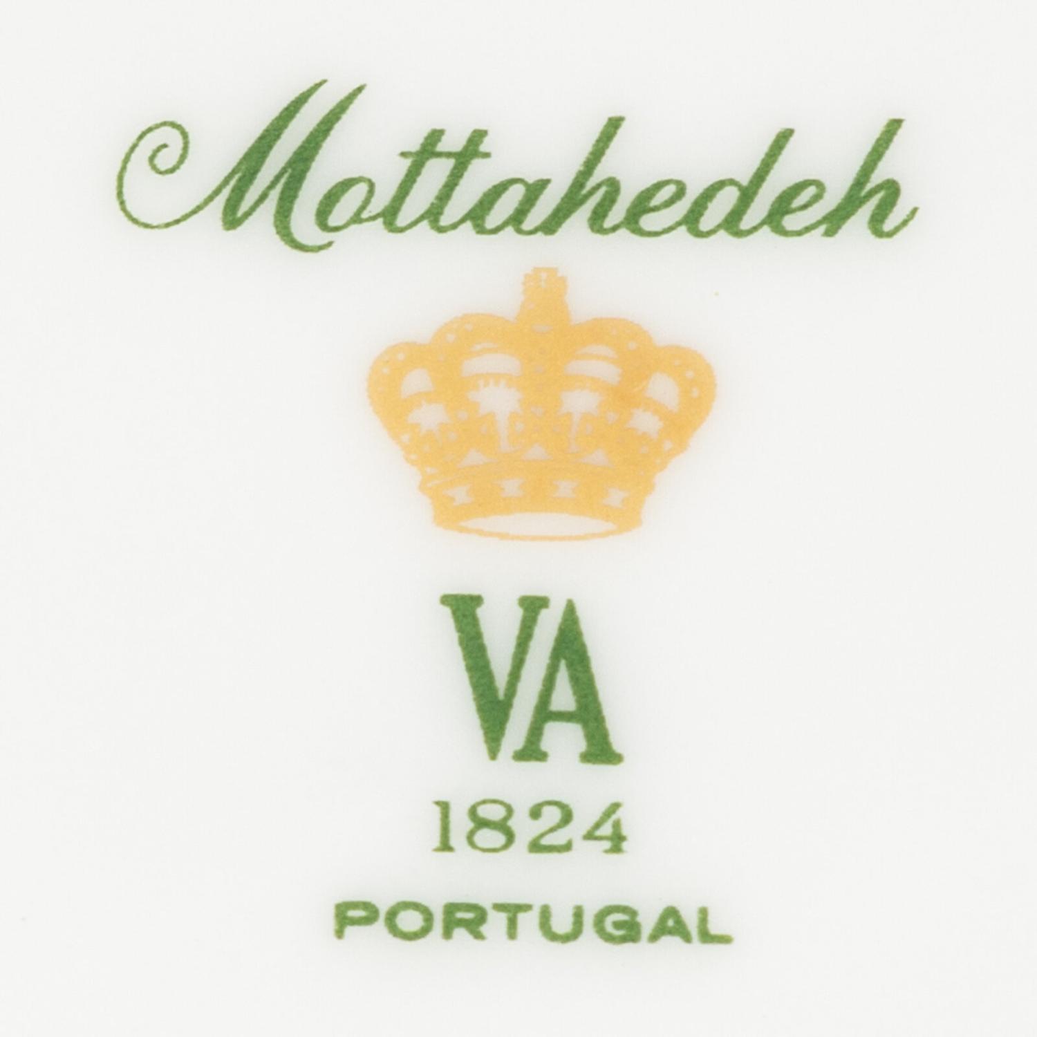 A Collection of Mottahedeh Salmon Porcelain Table Articles