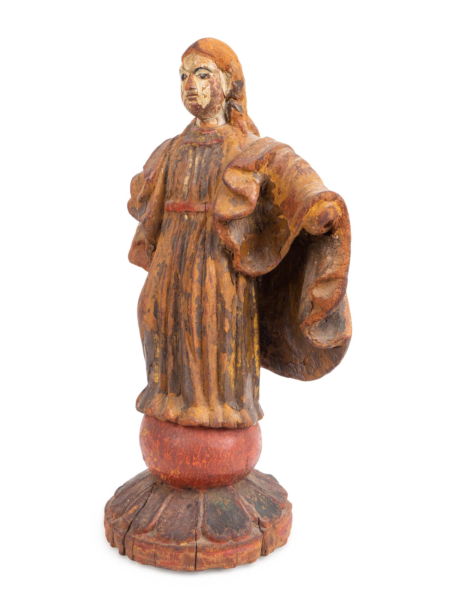A Spanish Colonial Carved and Painted Figure of a Saint — 19TH CENTURY