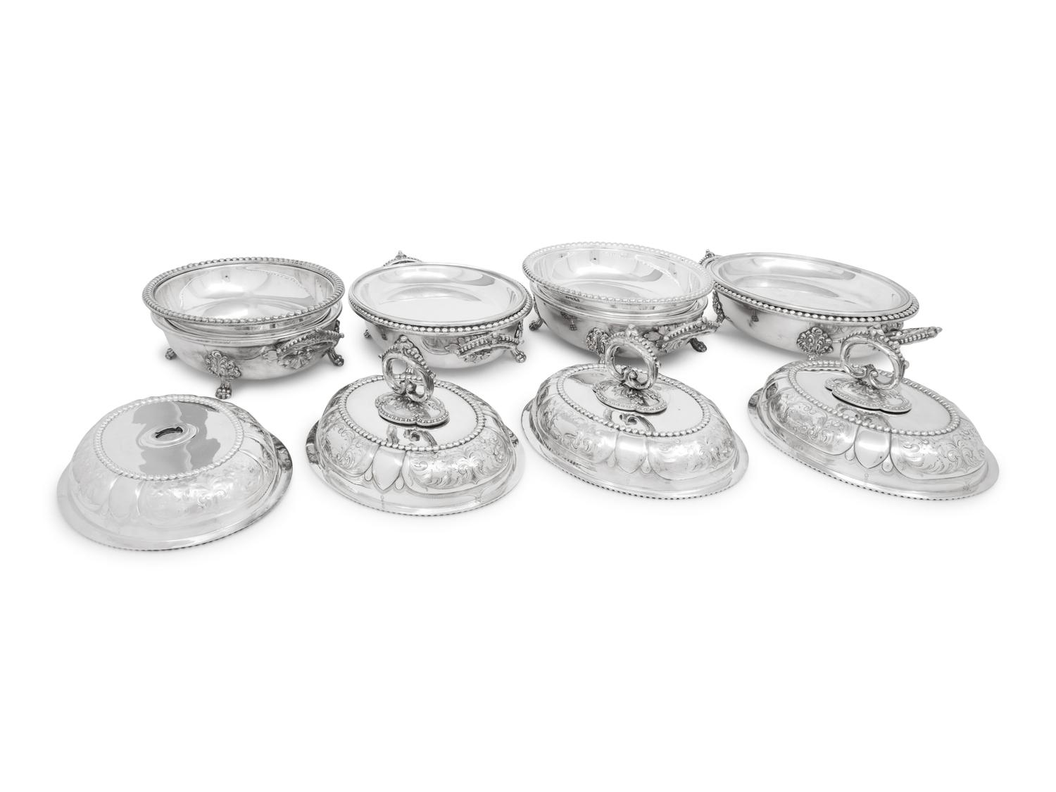 A Set of Four Victorian Silver-Plate Oval Vegetable Dishes with Covers and Liners