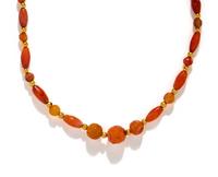 A Near Eastern Gold and Carnelian Bead Necklace
