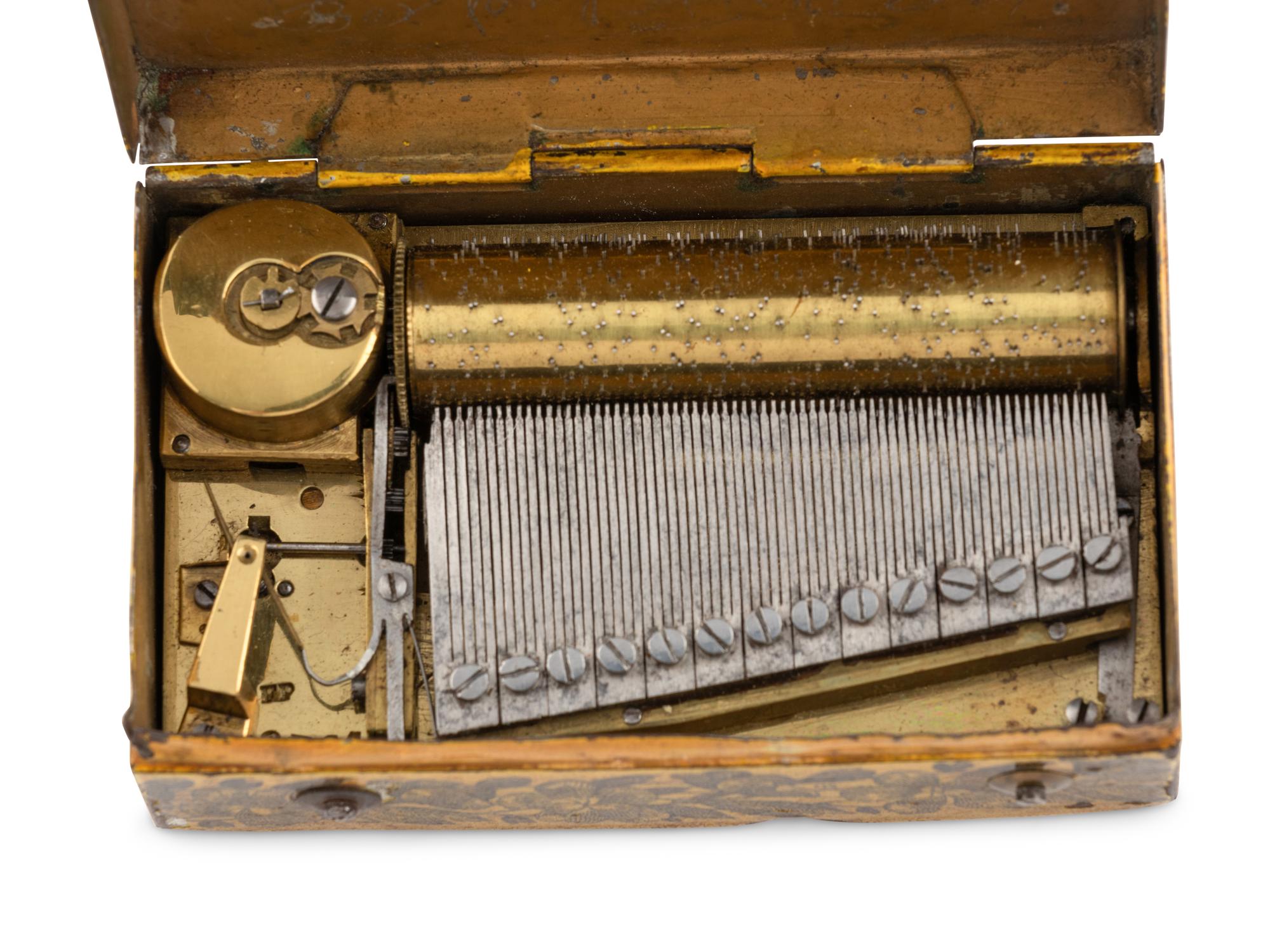A Musical Movement in a Tin Transfer Box