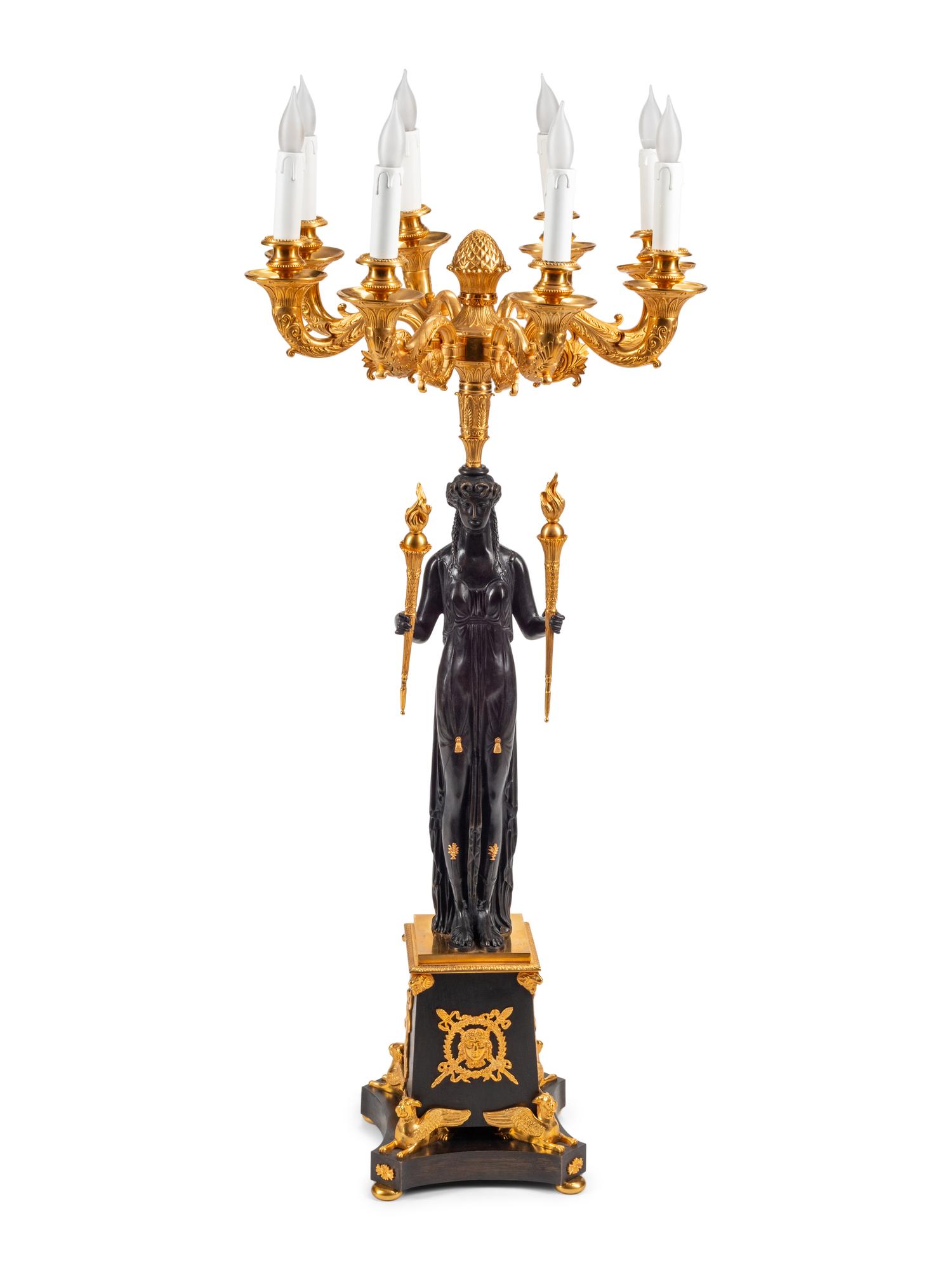 An Empire Style Gilt and Patinated Bronze Eight-Light Candelabrum