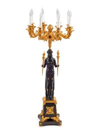 An Empire Style Gilt and Patinated Bronze Eight-Light Candelabrum