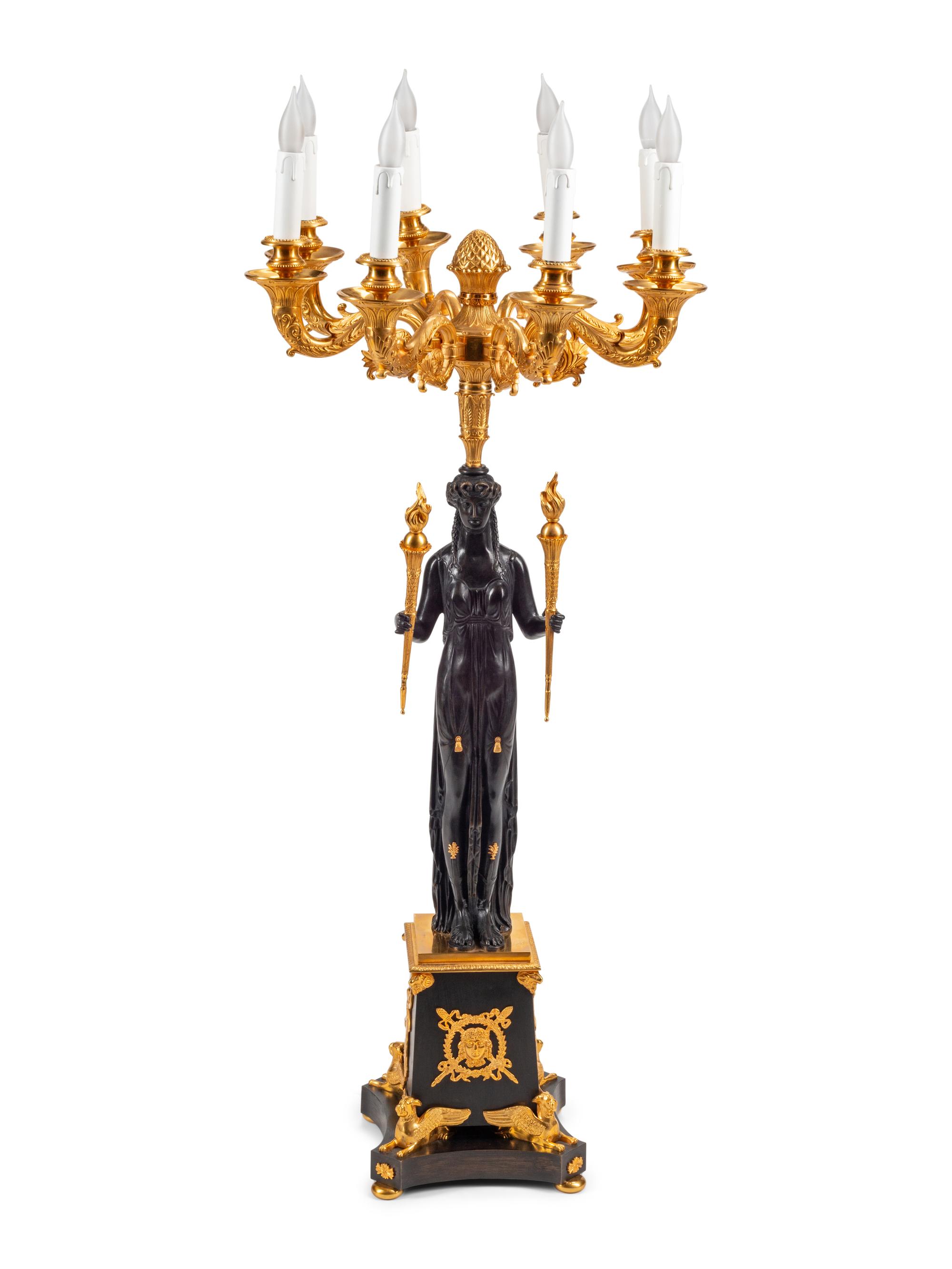 An Empire Style Gilt and Patinated Bronze Eight-Light Candelabrum