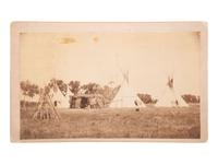 [NATIVE AMERICANS]. Boudoir card of a Crow Indian Camp with medicine pipe bundle visible.