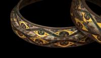 A Group of Four Chinese Gold and Silver Inlaid Bronze Fittings from Hu Vessels