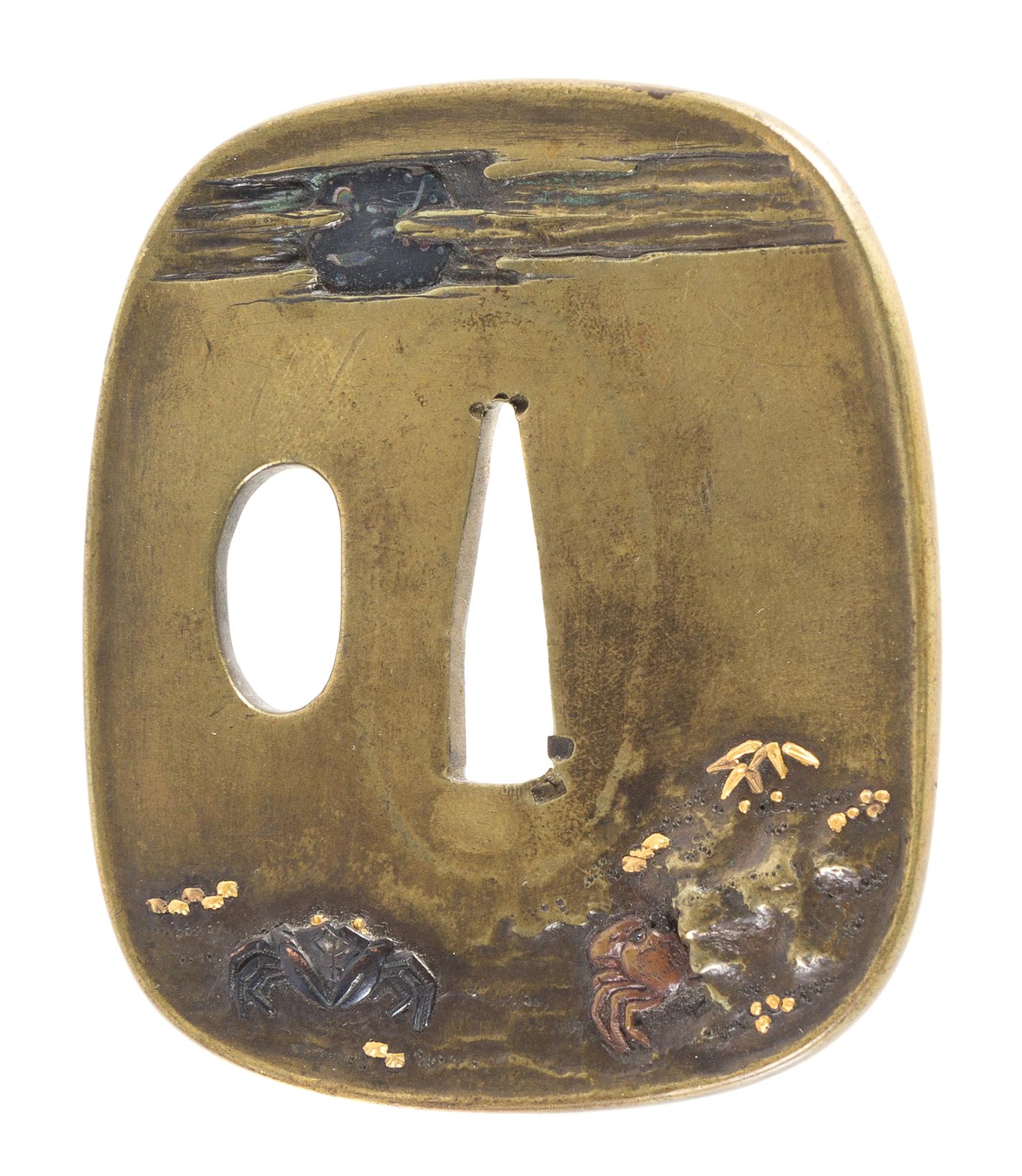 A Copper Tsuba Height 2 3/4 inches.