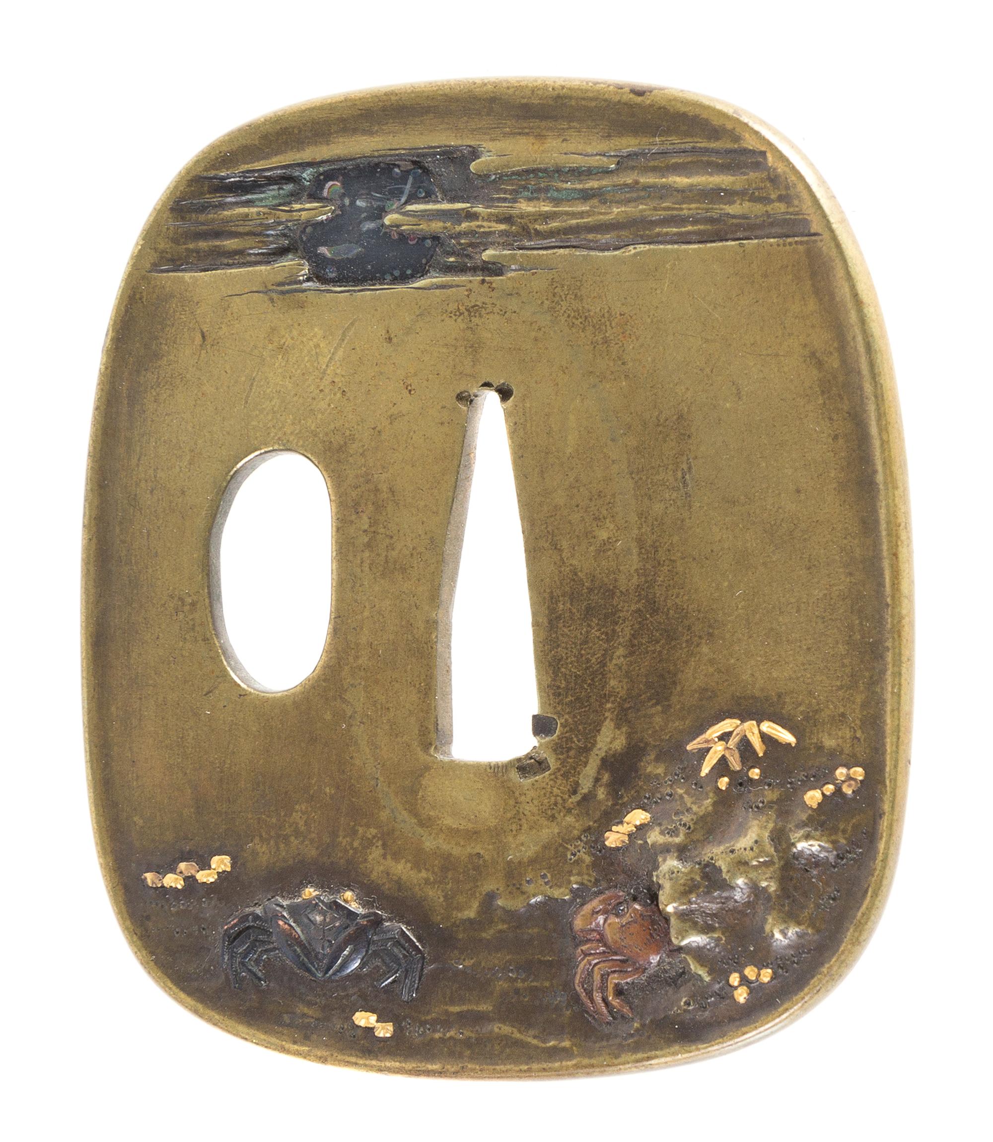 A Copper Tsuba Height 2 3/4 inches.