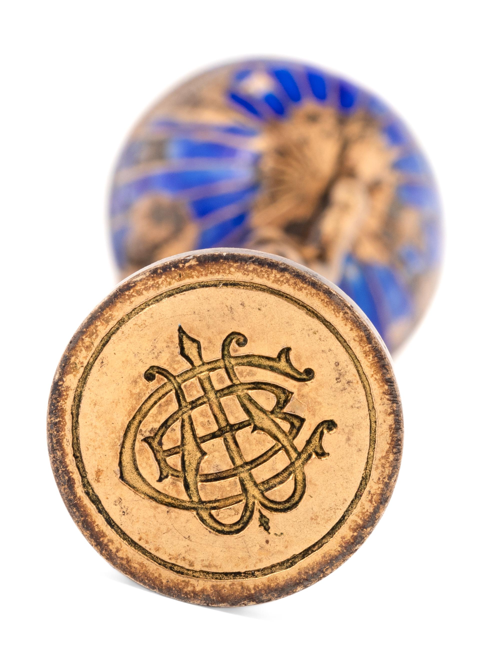A French Enameled Silver and Diamond-Mounted Figural Hand Seal
