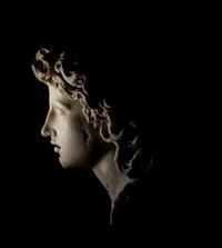 A Roman Marble Head of a Triton