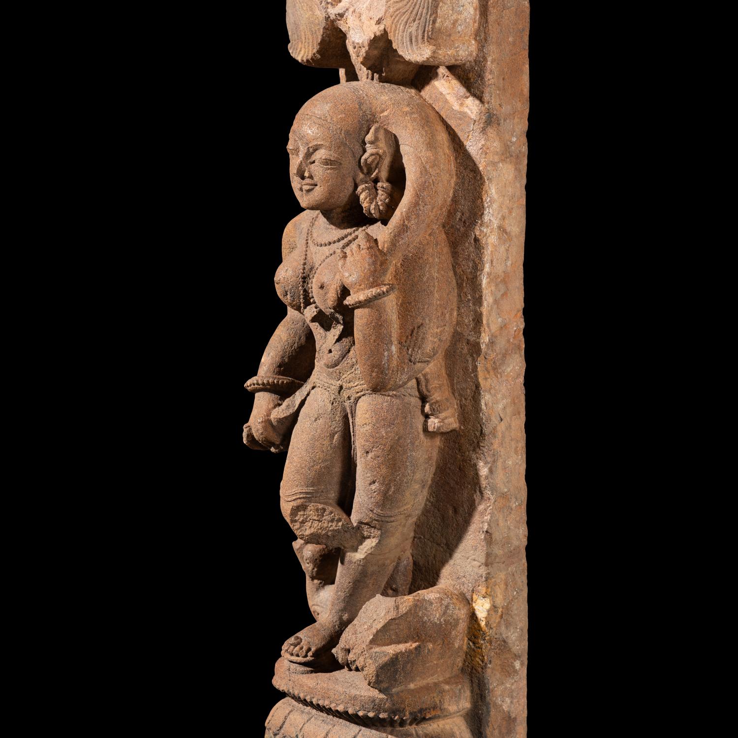 An Indian Sandstone Figure of an Apsara, Orissa, 11th Century
