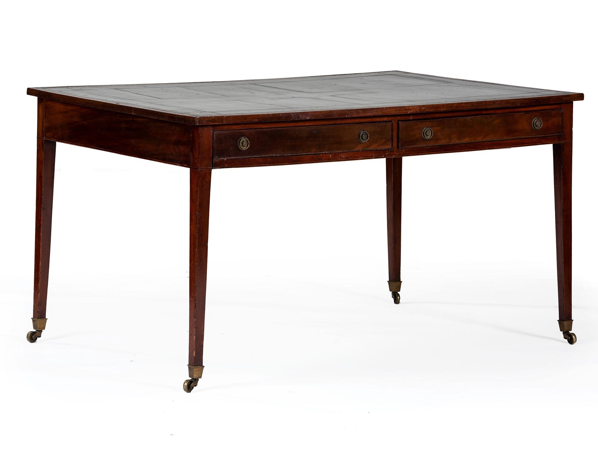 A Regency Mahogany and Leather Inset Writing Table