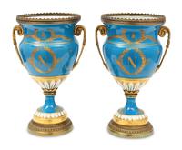A Pair of Sevres Style Porcelain and Gilt-Bronze Mounted Napoleonic Urns