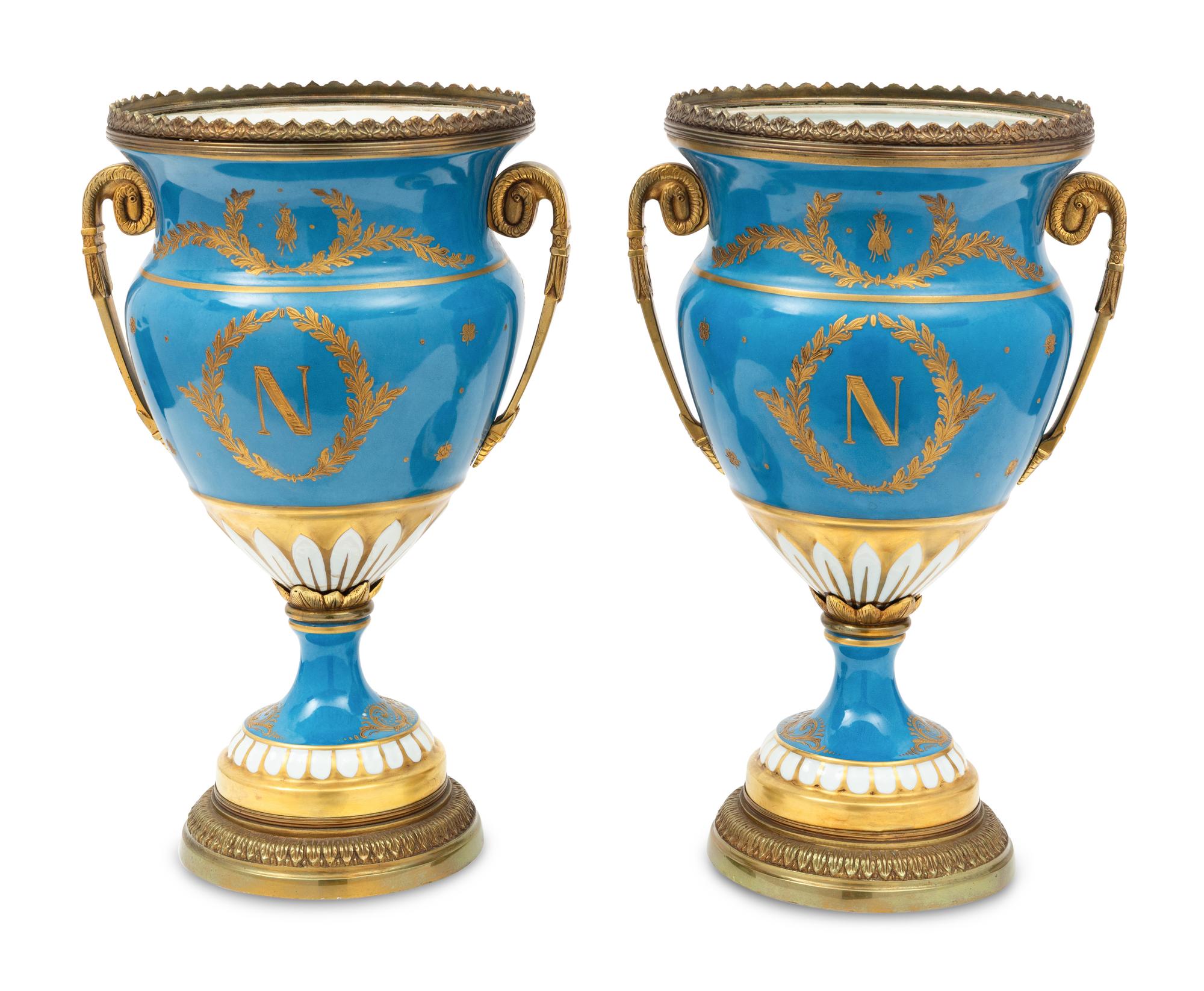 A Pair of Sevres Style Porcelain and Gilt-Bronze Mounted Napoleonic Urns