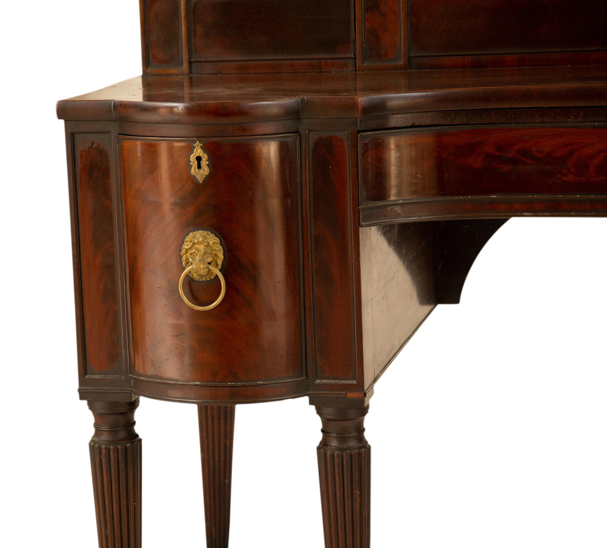 A Regency Mahogany Sideboard with Brass Rail