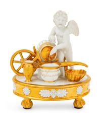 A Paris Porcelain Parcel Gilt Figural Encrier