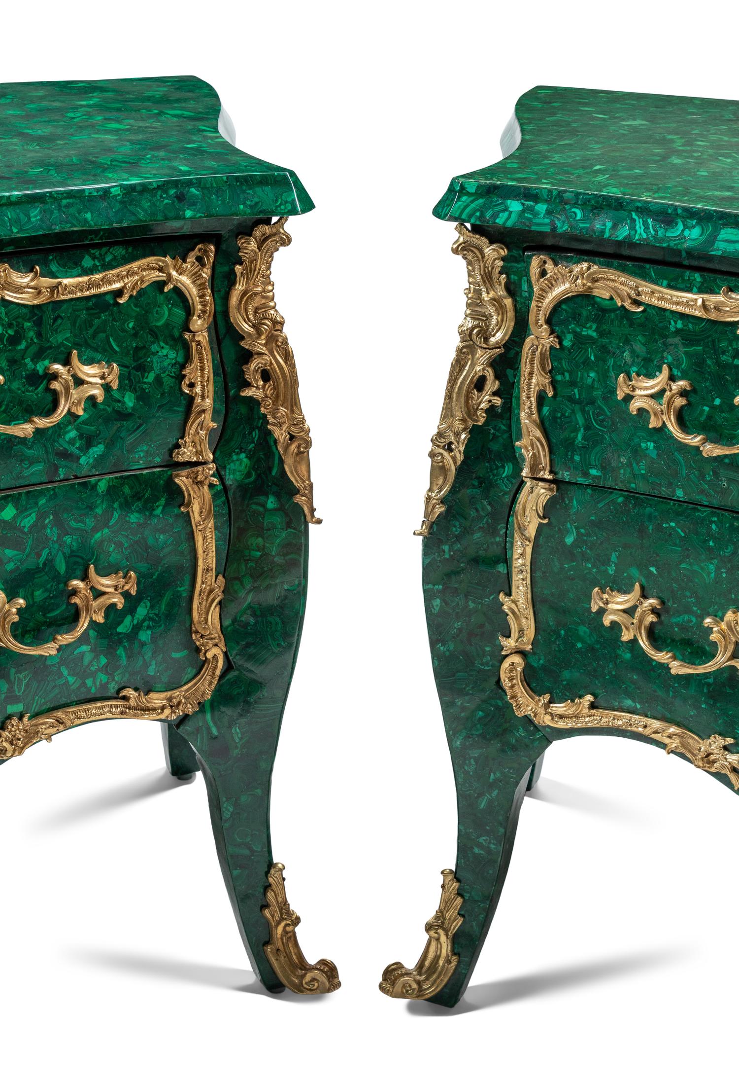 A Pair of Louis XV Style Gilt Bronze Mounted Malachite Commodes