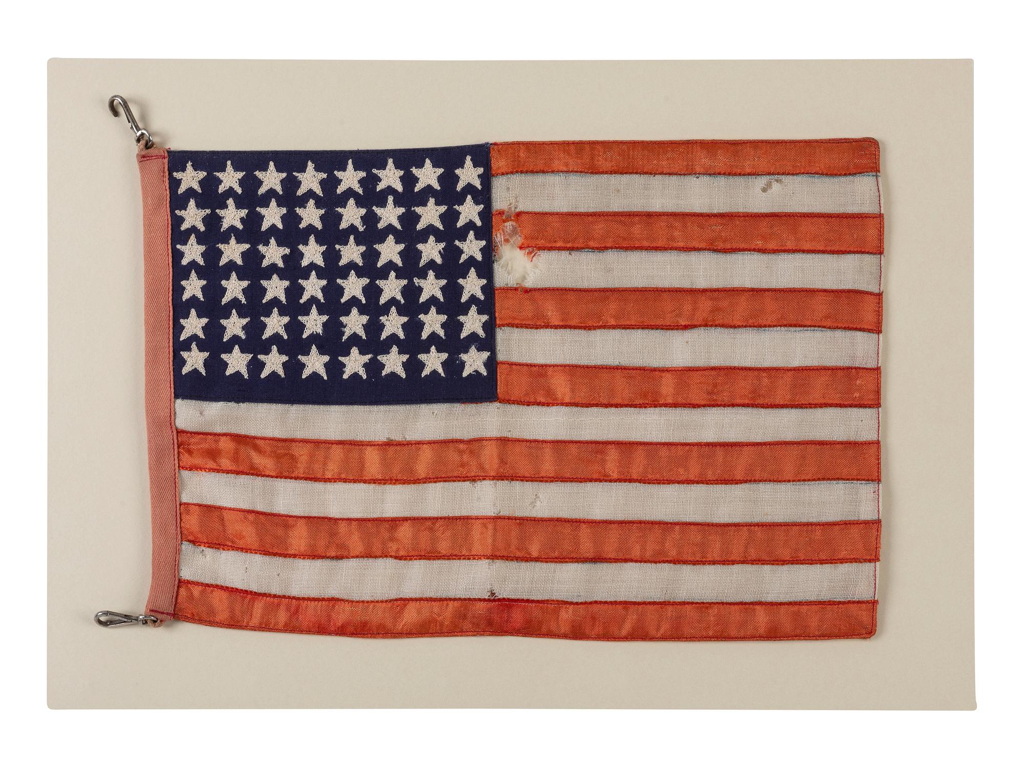 [FLAGS - WORLD WAR II]. 48-Star American parade flag from the US Military convoy that entered Berlin at the end of World War II. 1945.