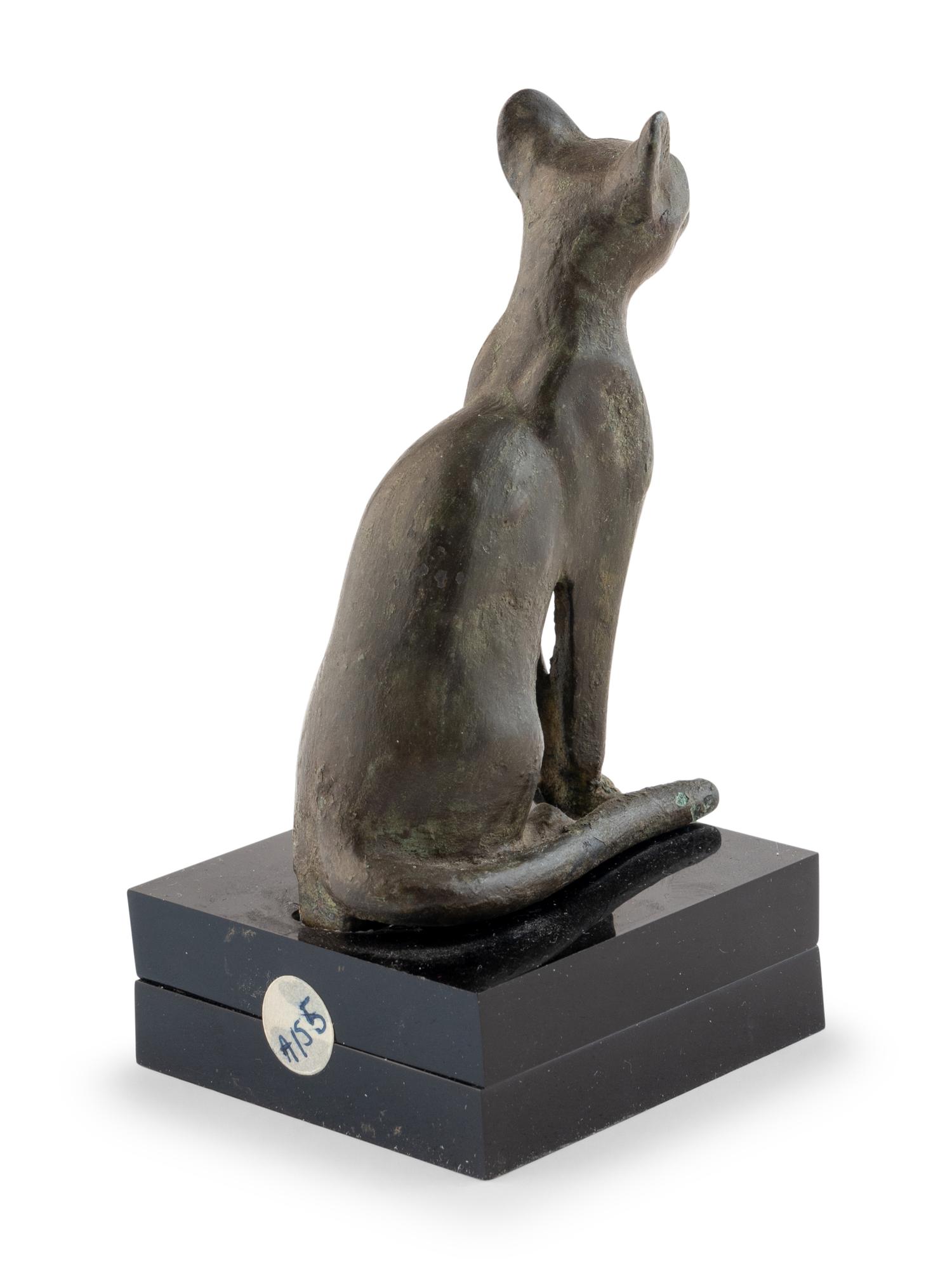 An Egyptian Bronze Seated Cat