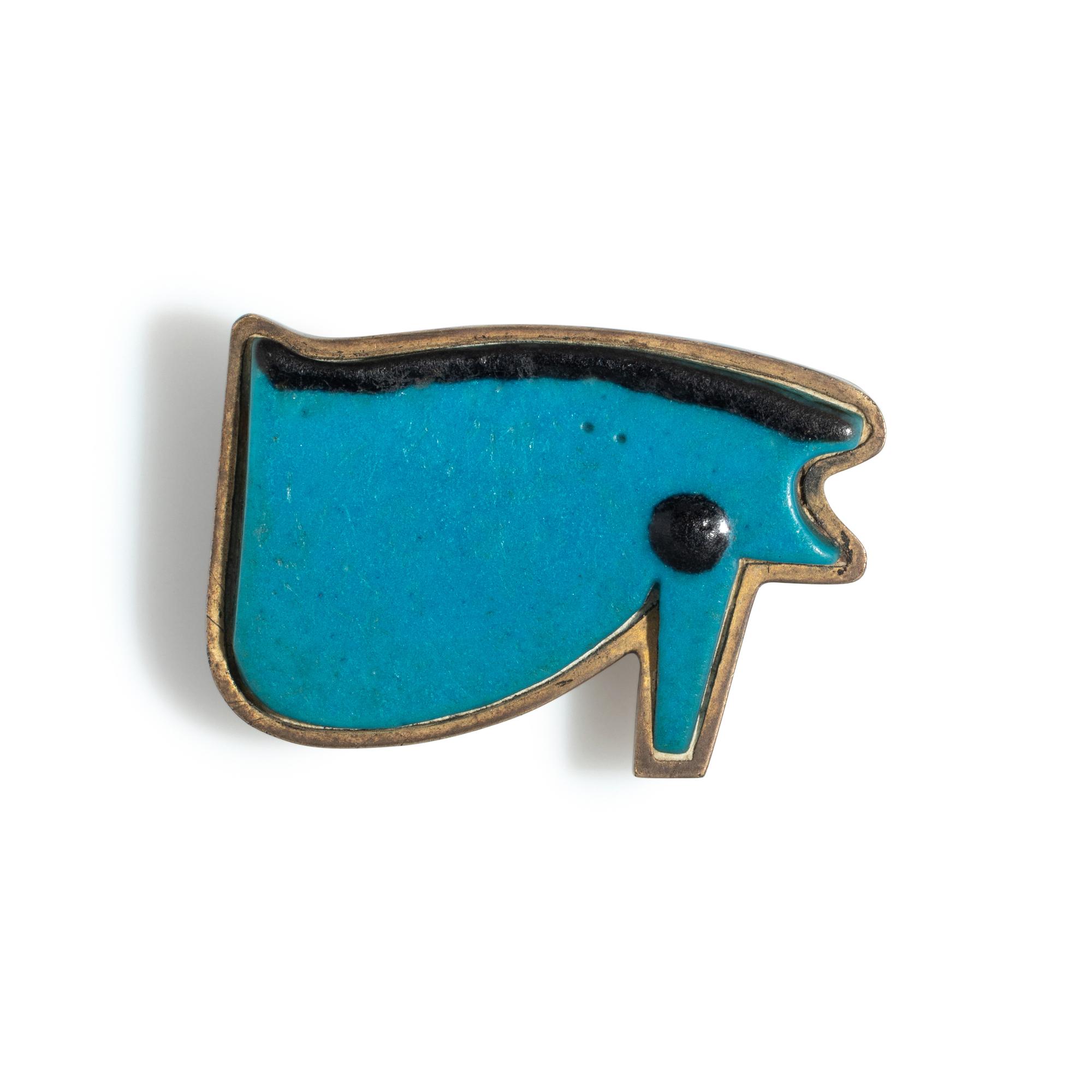 An Egyptian Blue Faience Wadjet Eye — Set in a silver brooch