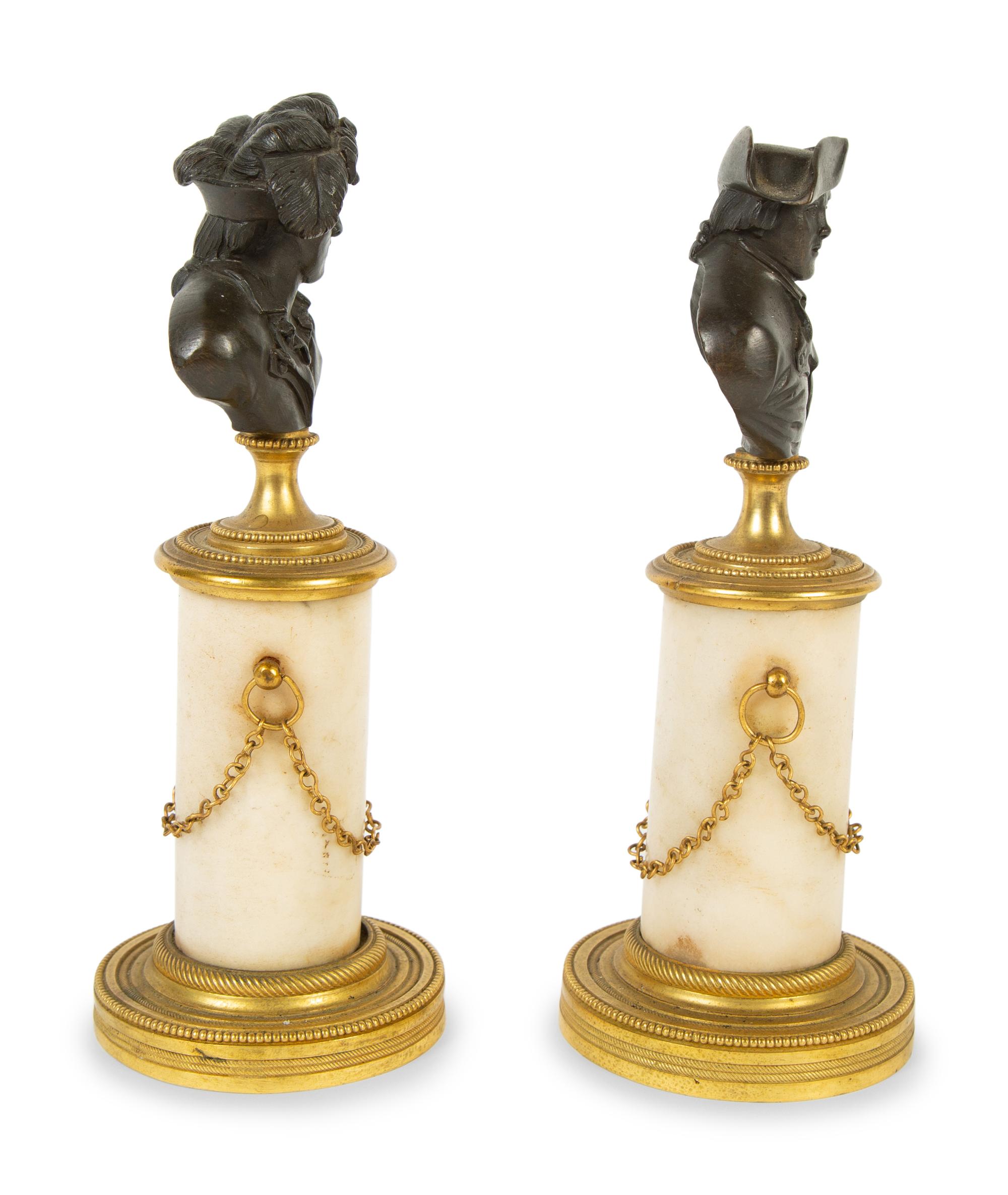 A Pair of French Bronze and Marble Small Busts