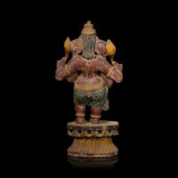 An Indian Carved and Polychromed Wood Figure of Ganesh, Late 19th to Early 20th Century