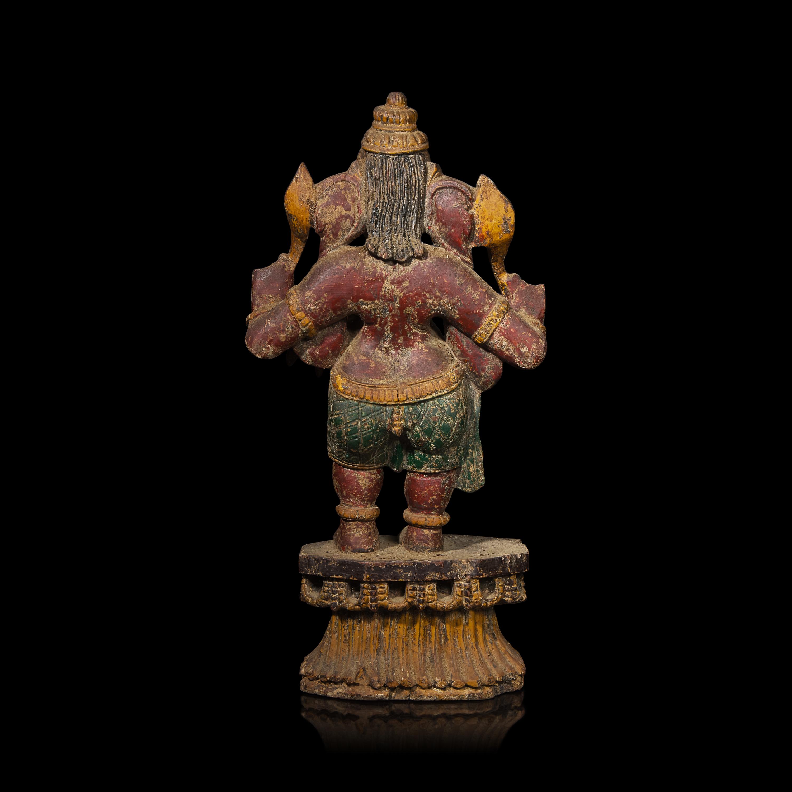 An Indian Carved and Polychromed Wood Figure of Ganesh, Late 19th to Early 20th Century