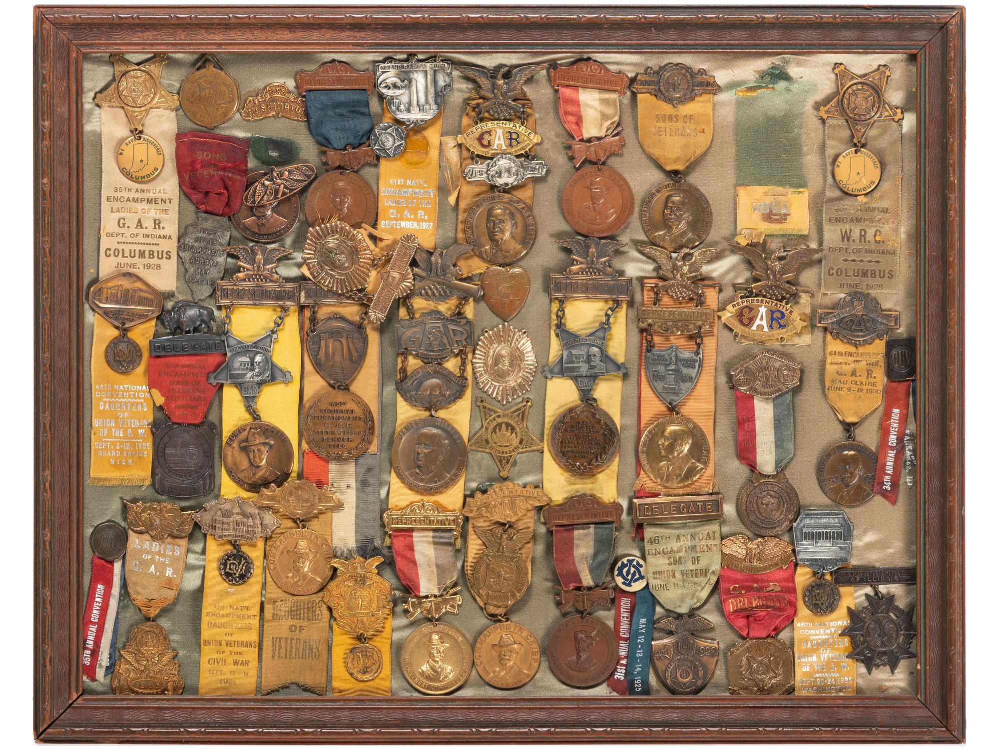 [CIVIL WAR - GRAND ARMY OF THE REPUBLIC]. A large framed collection of GAR and auxiliary organization medals and badges, including: