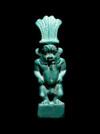 An Egyptian Faience Amulet of Bes