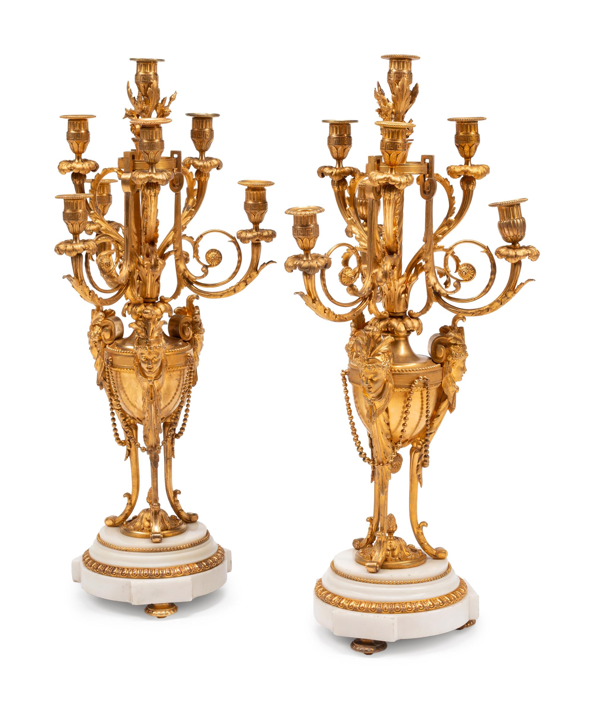 A Pair of Louis XVI Style Gilt Bronze and Marble Seven-Light Candelabra