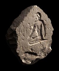 An Egyptian Limestone Fragmentary Inscription