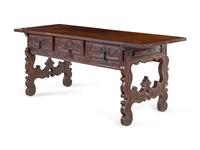 A Continental Carved Walnut Trestle Table