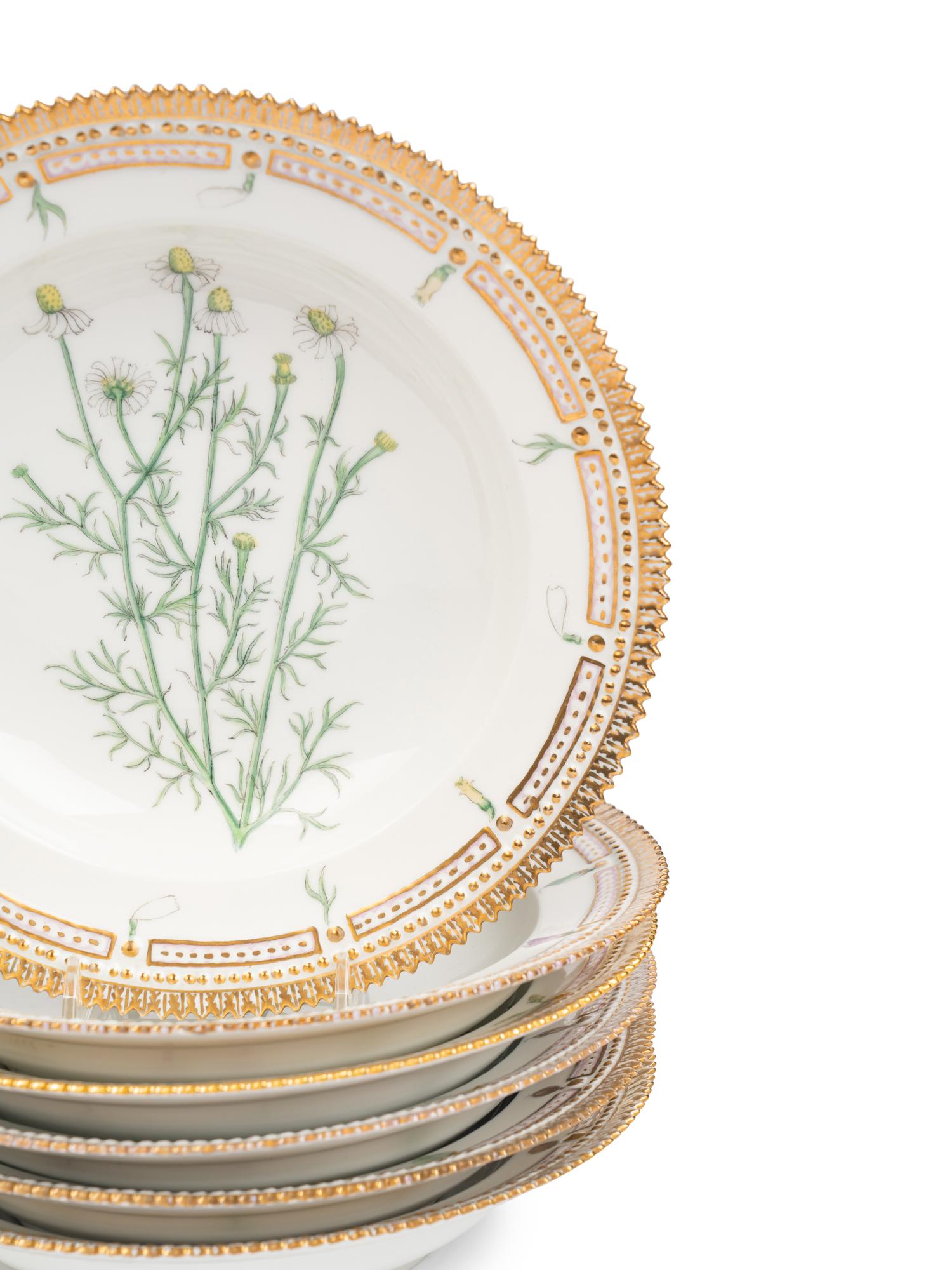 A Group of Thirteen Royal Copenhagen Porcelain Soup Plates